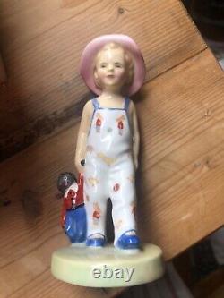 Royal Doulton 842482 Boy in Blue Overalls with Toy Doll 1945 Rare