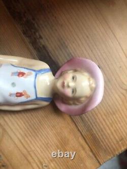 Royal Doulton 842482 Boy in Blue Overalls with Toy Doll 1945 Rare